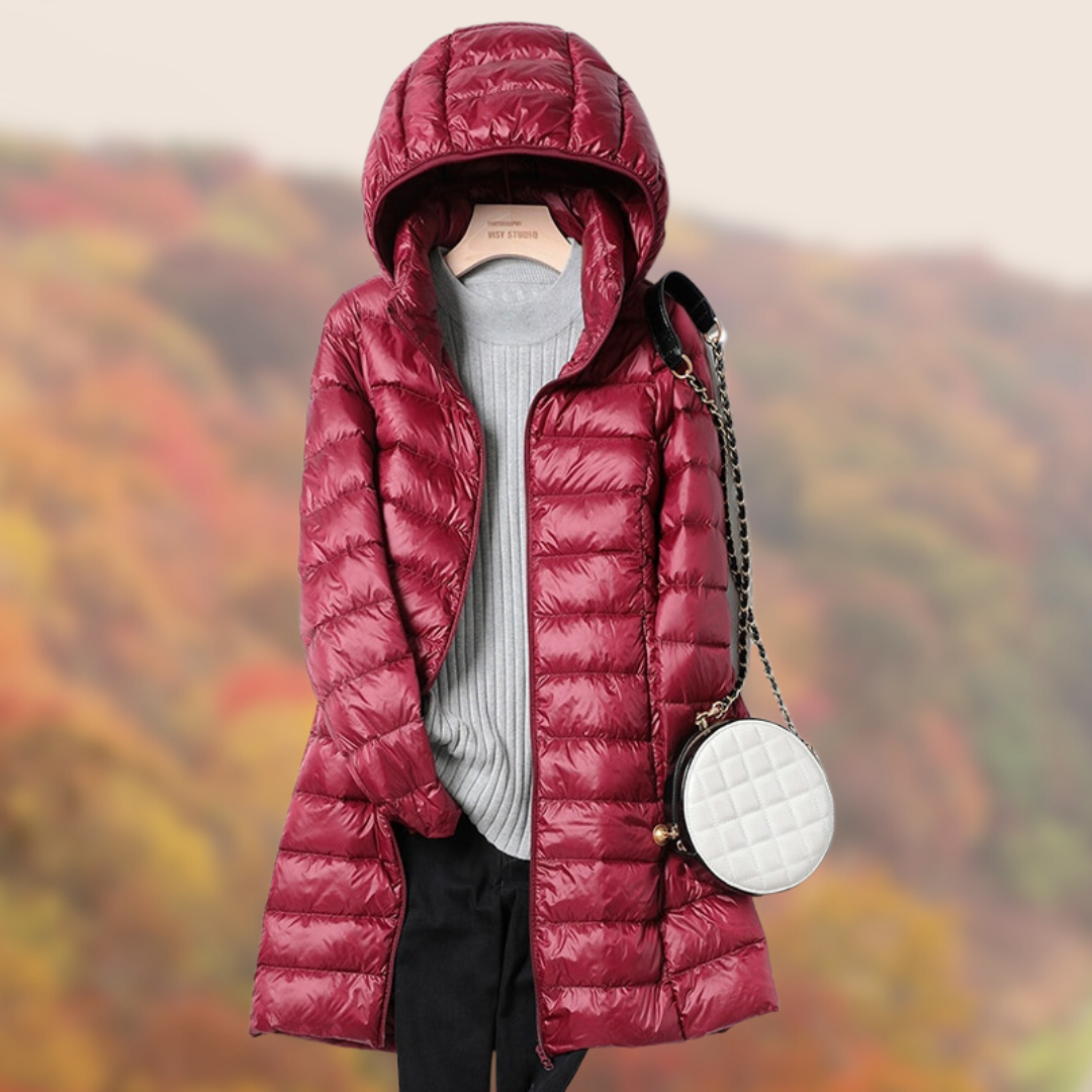 Burgundy women's long winter coat, a warm hooded puffer jacket for ultimate cold weather protection.