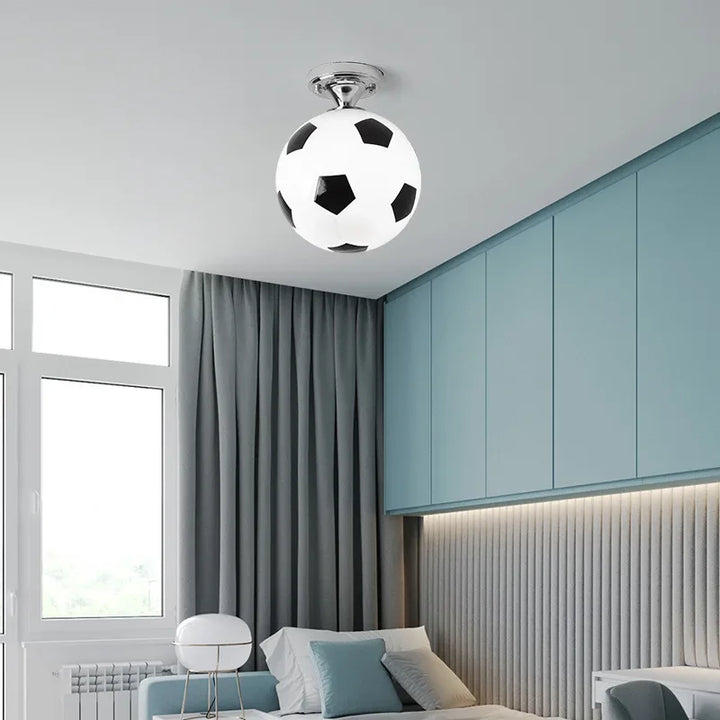 Kids' sports LED ceiling light, perfect for playrooms & bedrooms. Features football, basketball, baseball.