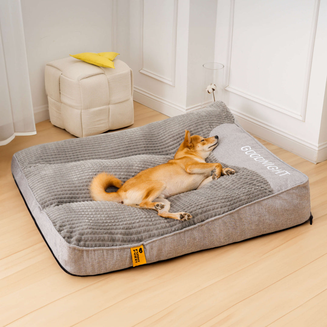 Ergonomic large orthopedic dog bed with thick, comfortable foam and neck support. Removable washable cover.