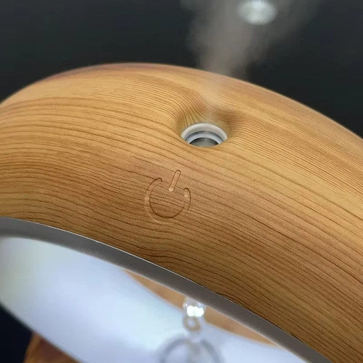 "Levitating Water Droplet Ultrasonic Humidifier with LED light, showing floating droplets effect, perfect for modern decor."