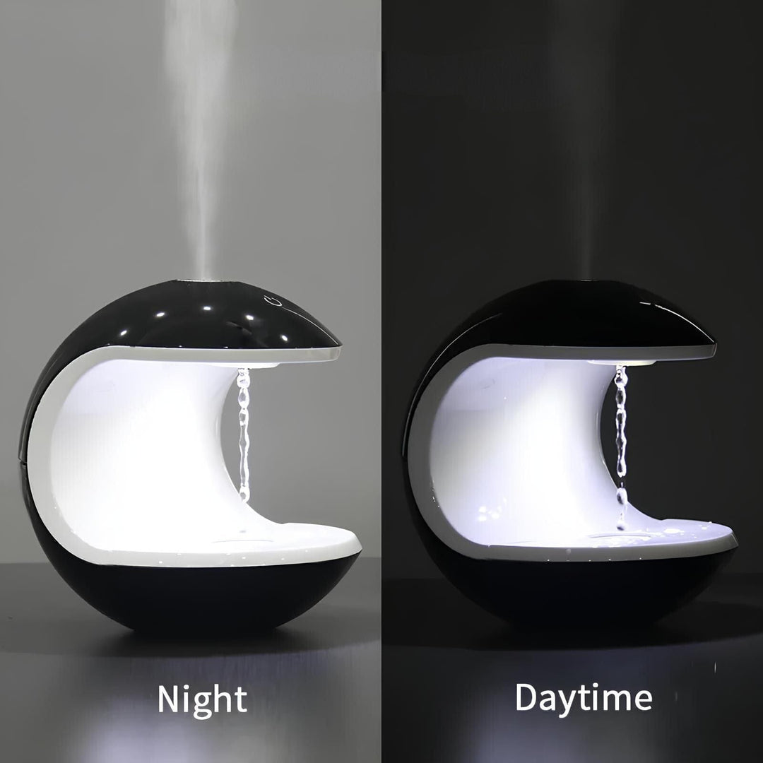 "Levitating Water Droplet Ultrasonic Humidifier with LED light, showing floating droplets effect, perfect for modern decor."