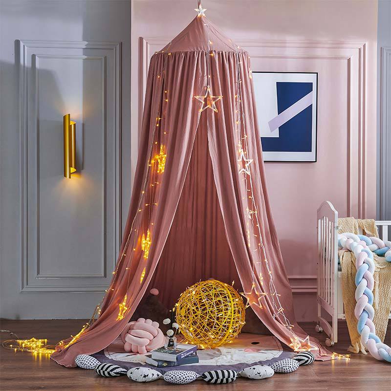 "Light green children's blackout bed canopy; elegant polyester fabric; blocks light; ideal for cribs, creating a cozy vibe."