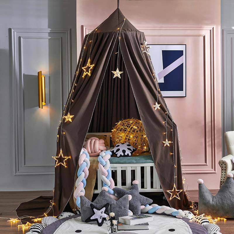 "Light green children's blackout bed canopy; elegant polyester fabric; blocks light; ideal for cribs, creating a cozy vibe."