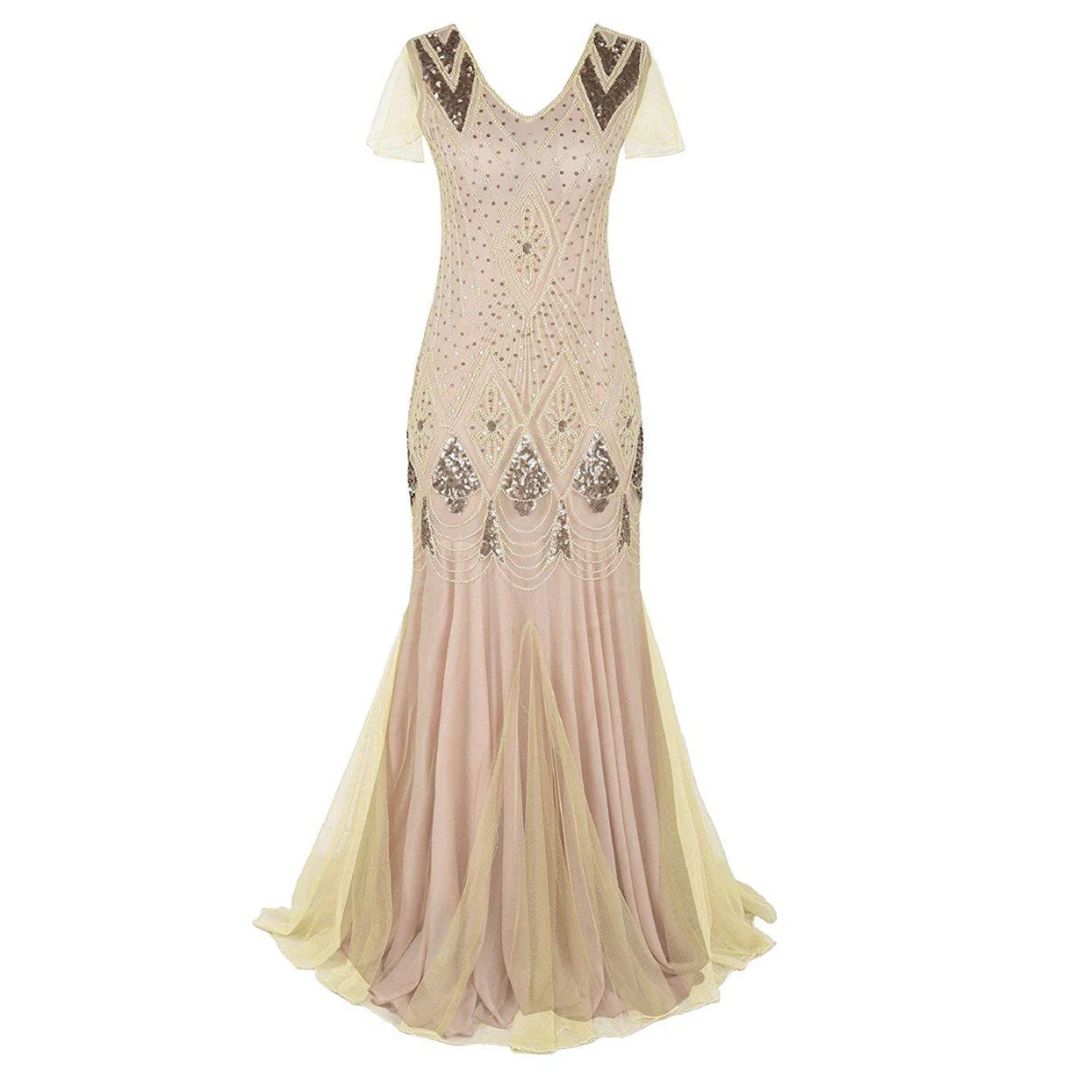 Dazzling long flapper dress with sequins & fringe, a stunning vintage women's evening attire.