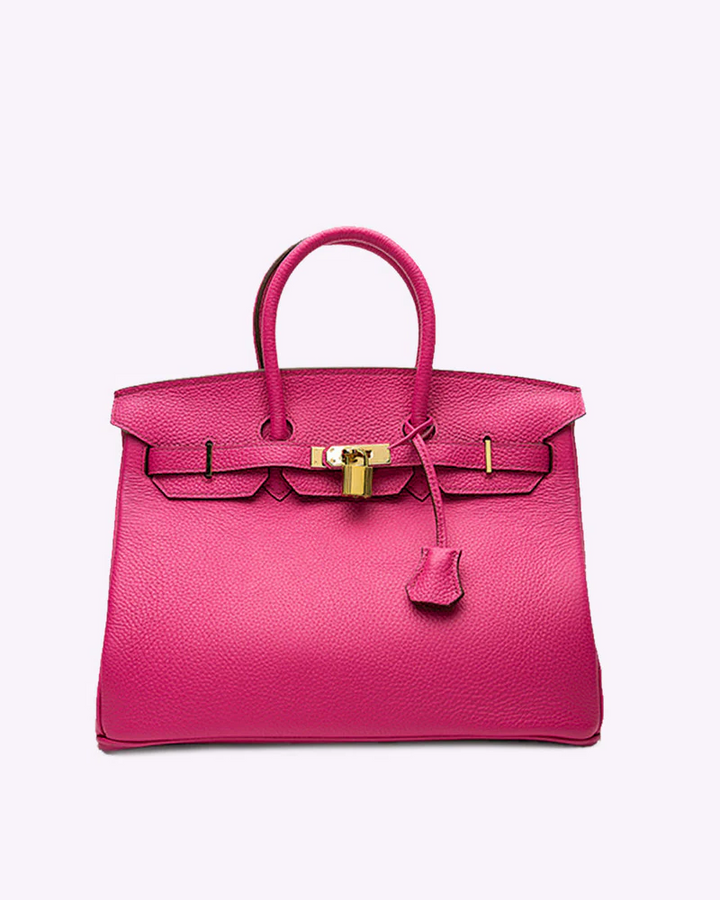 Genuine leather women's travel tote handbag. A luxurious and chic shoulder bag for work or everyday style.