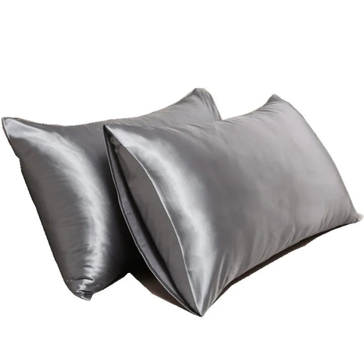 Luxurious mulberry silk pillowcase, unisex, pure silk, close-up of elegant smooth texture enhances skin and hair health.