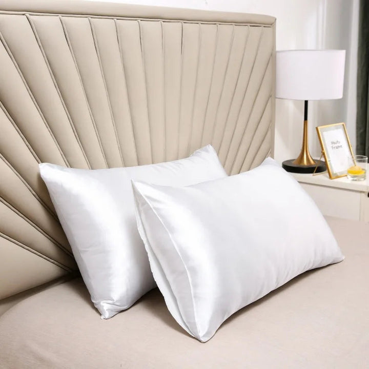 Luxurious mulberry silk pillowcase, unisex, pure silk, close-up of elegant smooth texture enhances skin and hair health.