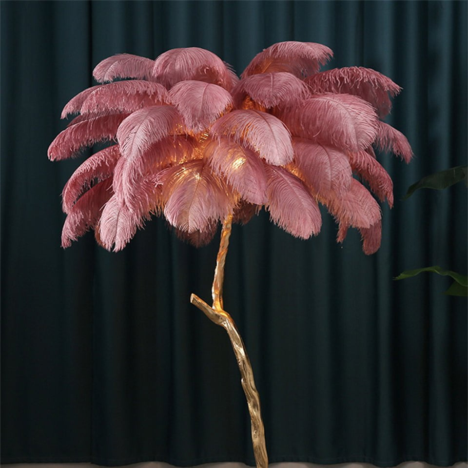 Luxurious Ostrich Feather Floor Lamp with cascading feathers, polished brass finish, and resin base for elegant home lighting