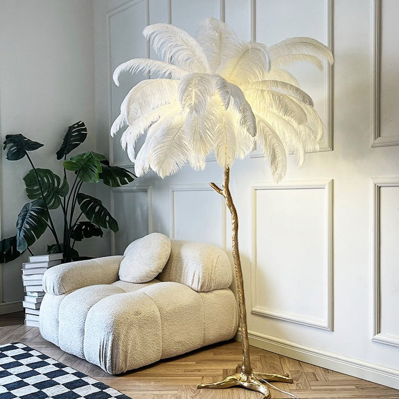 Luxurious Ostrich Feather Floor Lamp with cascading feathers, polished brass finish, and resin base for elegant home lighting