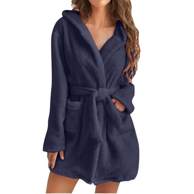 Relax in this comfortable women's hooded bathrobe. Soft plush fleece for warmth & ultimate loungewear.