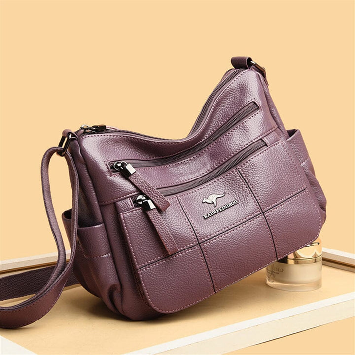 Elegant women's leather tote bag, luxury design with spacious interior, work or events.