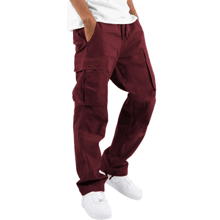 Stylish men's cargo joggers with practical utility pockets for essential storage. Streetwear ready.