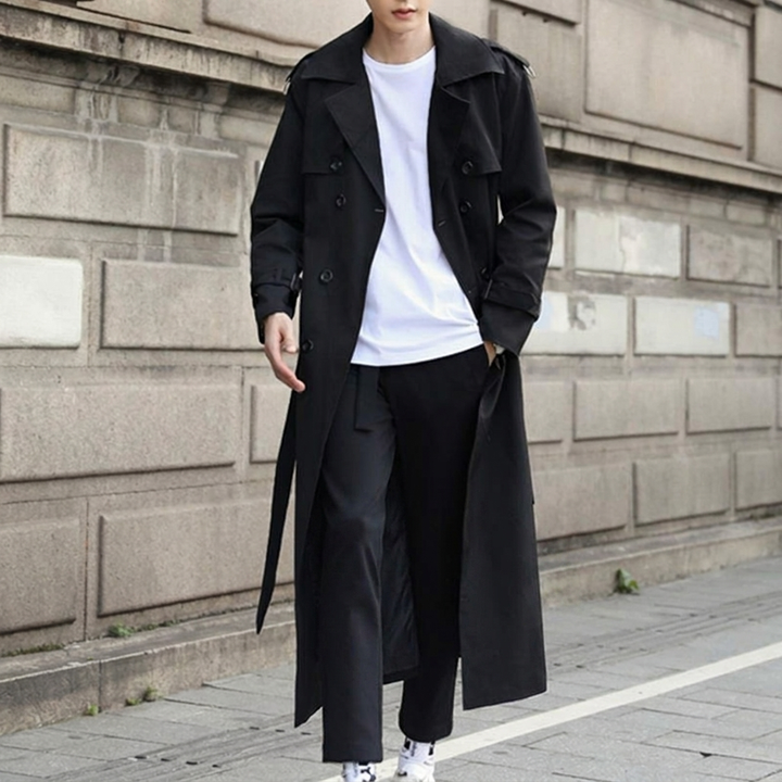 Classic khaki men's double-breasted trench coat, long and sophisticated with an adjustable belted waist.