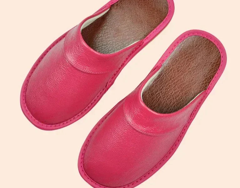 Soft leather men's house slippers, designed for cozy indoor comfort and durable home lounge wear.