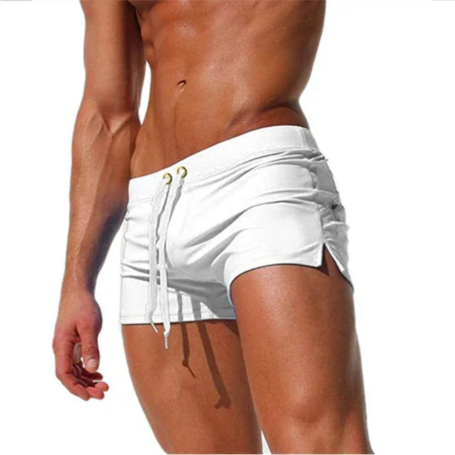 Men's quick-dry swim shorts for beach & pool. Breathable swimwear, a summer vacation essential.
