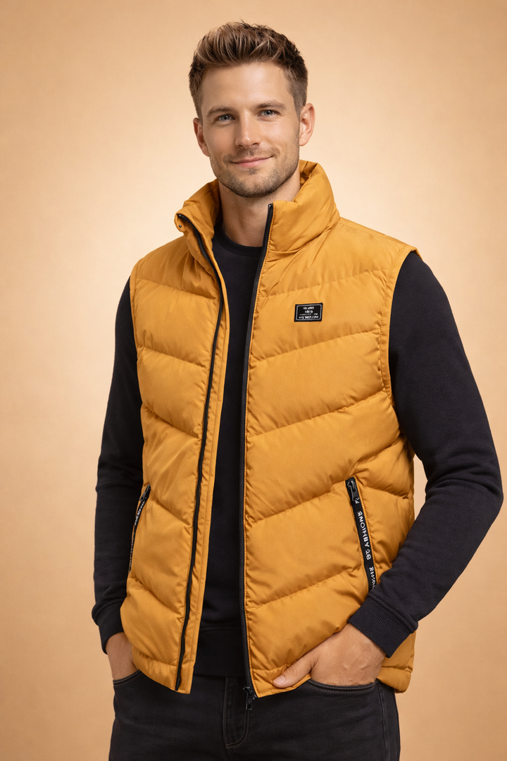 Men's quilted puffer vest, insulating & stylish for autumn/winter layering. Modern fit sleeveless jacket.