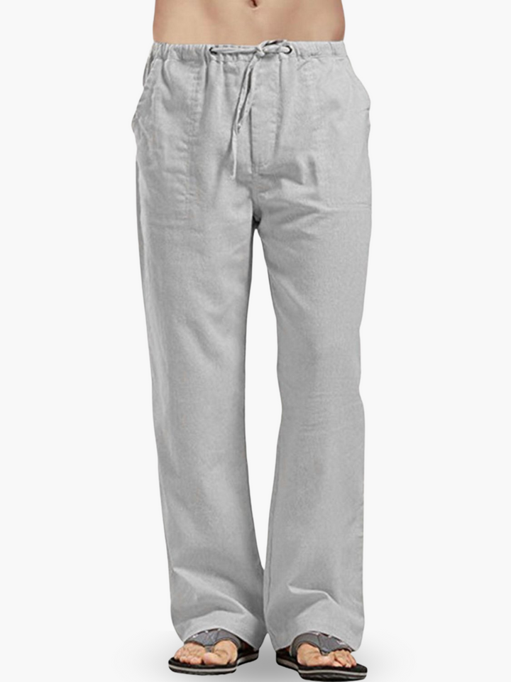 Versatile men's casual pants with a drawstring and relaxed fit, suitable for everyday wear, lounge, or travel.