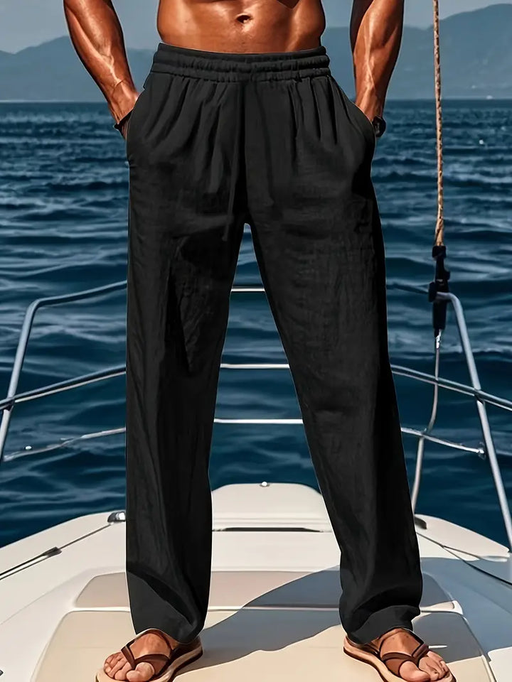 Stylish men's loose fit summer pants with a comfortable drawstring waist, ideal for holidays and relaxed casual outfits.