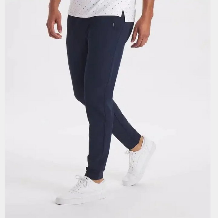 Stylish men's fashion stretch pants, offering wind and water protection for outdoor and casual wear.