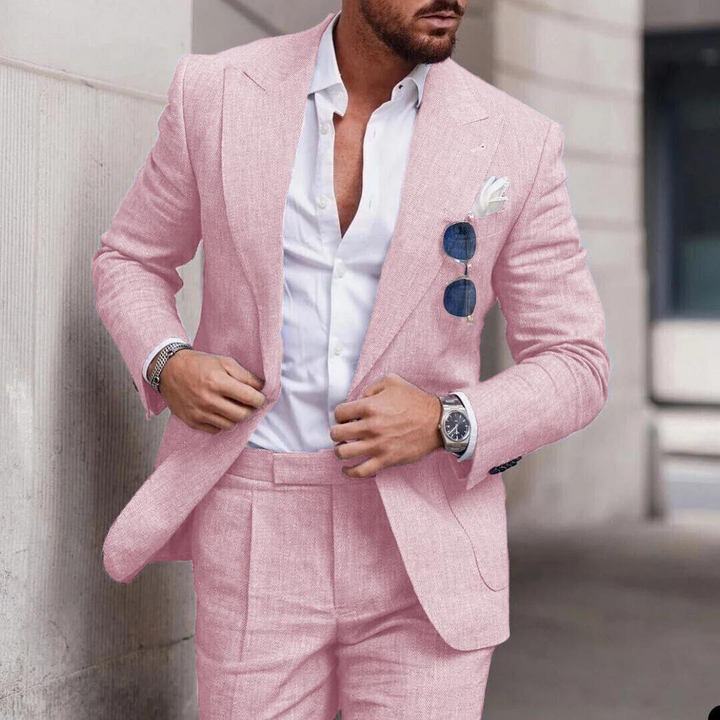 Pink men's 2-piece linen suit, ideal for trendy beach weddings and summer fashion.