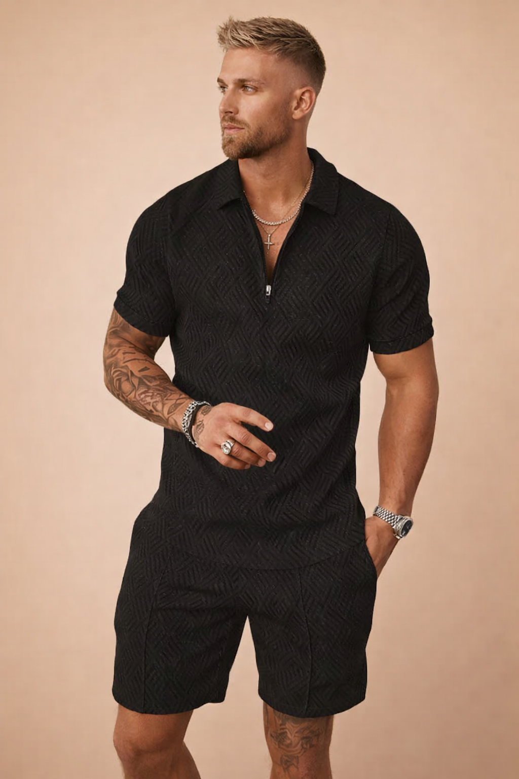 Casual men's summer outfit: textured collared polo shirt and matching tailored shorts.