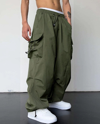 "Men's baggy wide leg cargo pants with large pockets, relaxed fit, durable fabric, perfect for casual style and comfort."