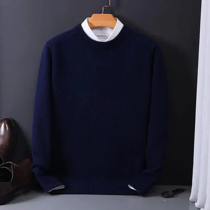 "Men's cashmere loose sweater, soft grey hue, relaxed fit, ribbed finishes, perfect for versatile autumn-winter style."