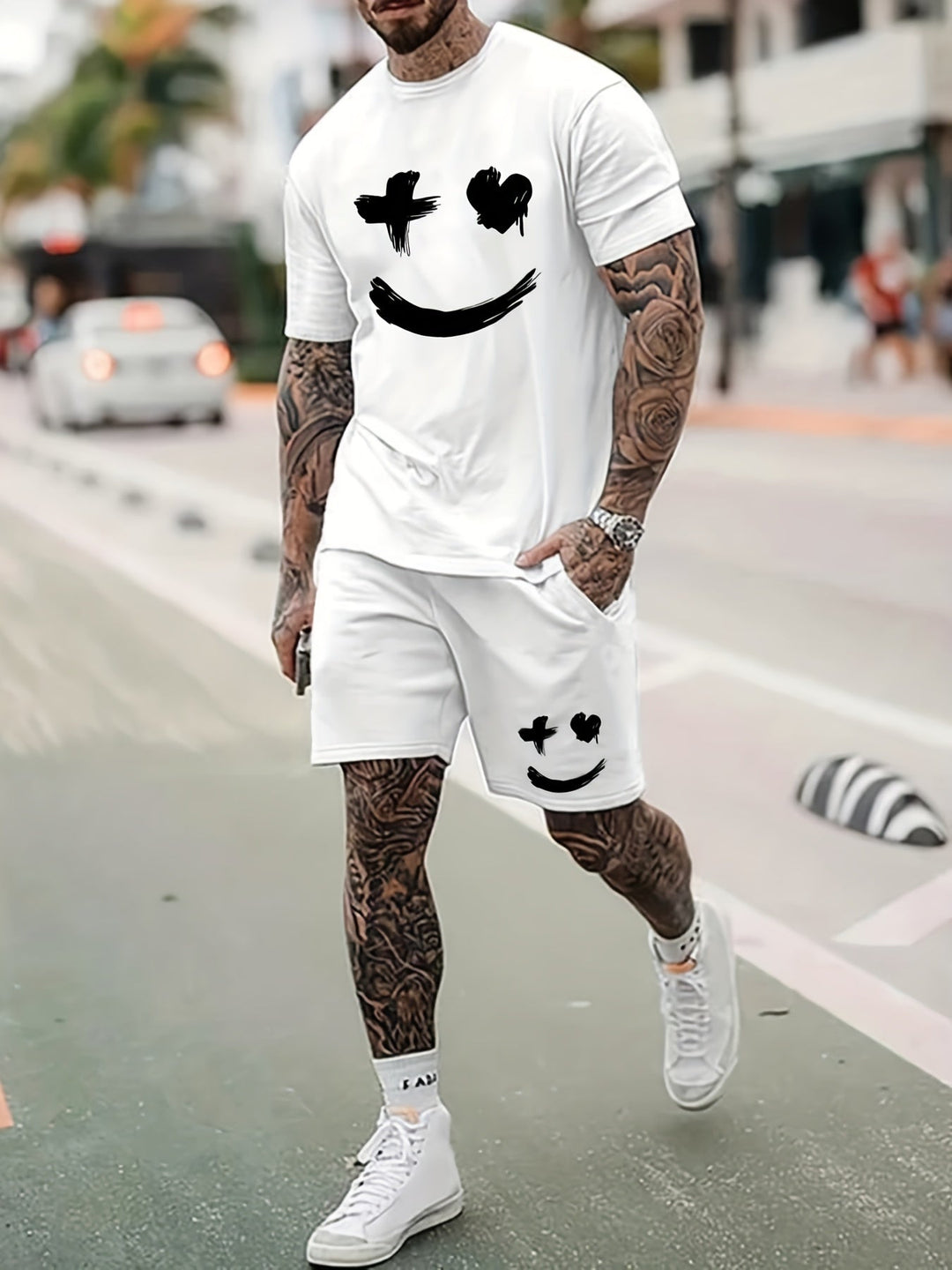"Men's casual set with bold smiley face print T-shirt and matching drawstring shorts, vibrant and eye-catching for summer."