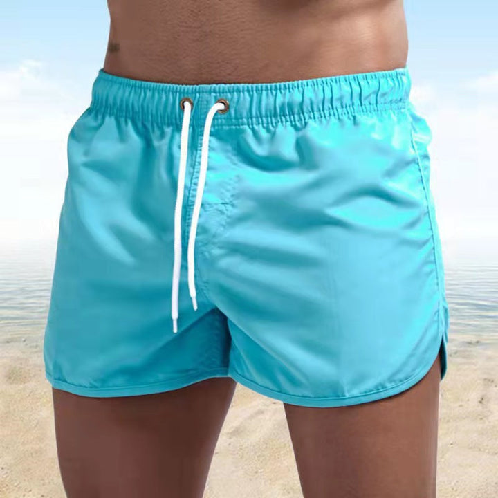Men's casual swim shorts with adjustable waistband, relaxed fit, and versatile style, perfect for beach and pool days.