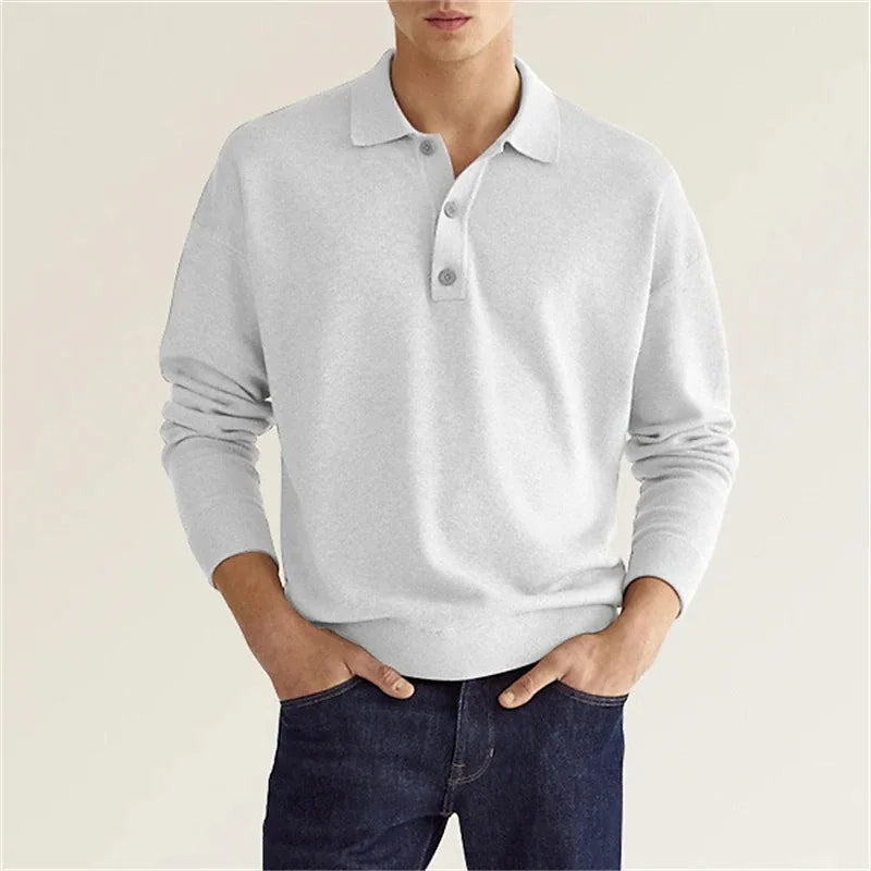 Men's classic long-sleeve polo shirt in grey with a polished collar, showcasing modern comfort and trendy fashion.