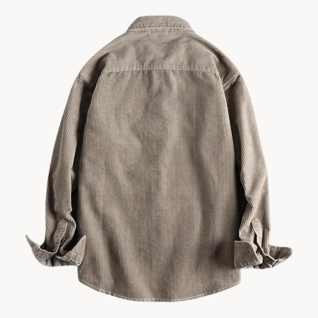 Men's classic orange corduroy shirt with button-down front and textured fabric, ideal for layering and timeless style.