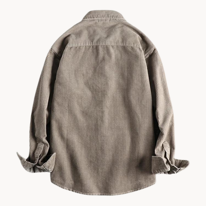 Men's classic orange corduroy shirt with button-down front and textured fabric, ideal for layering and timeless style.