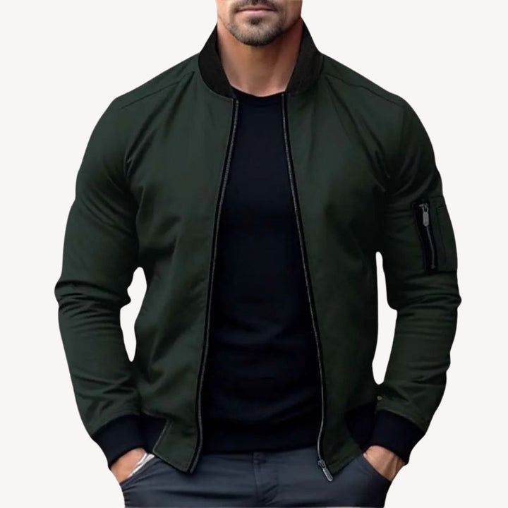Men's classic zip-up bomber jacket with ribbed details, polyester fabric, versatile for layering, displayed front view.