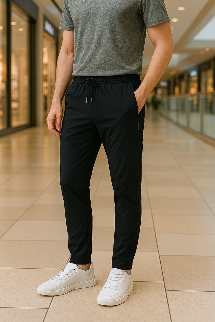 Men's cotton chino pants with a sleek, modern fit in versatile shades, perfect for formal or casual occasions.