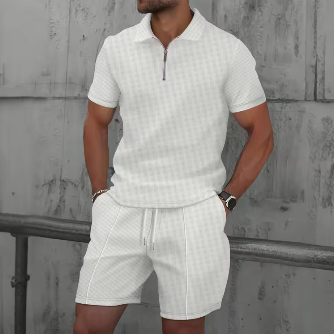 "Men's cotton co-ord set with a short-sleeved zip-neck polo and drawstring shorts, perfect for casual summer style."