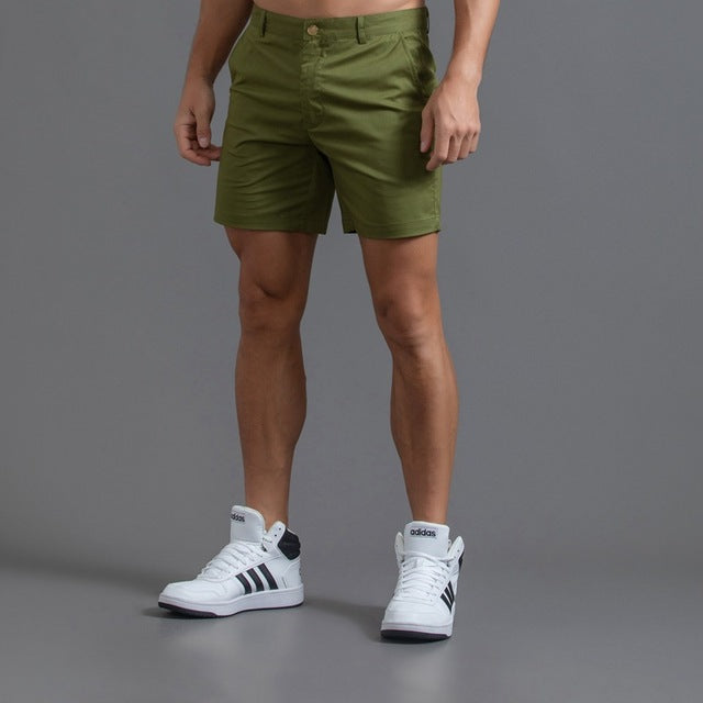 Men's cotton knee-length chino shorts in khaki, featuring a classic summer design and breathable material, ideal for casual w