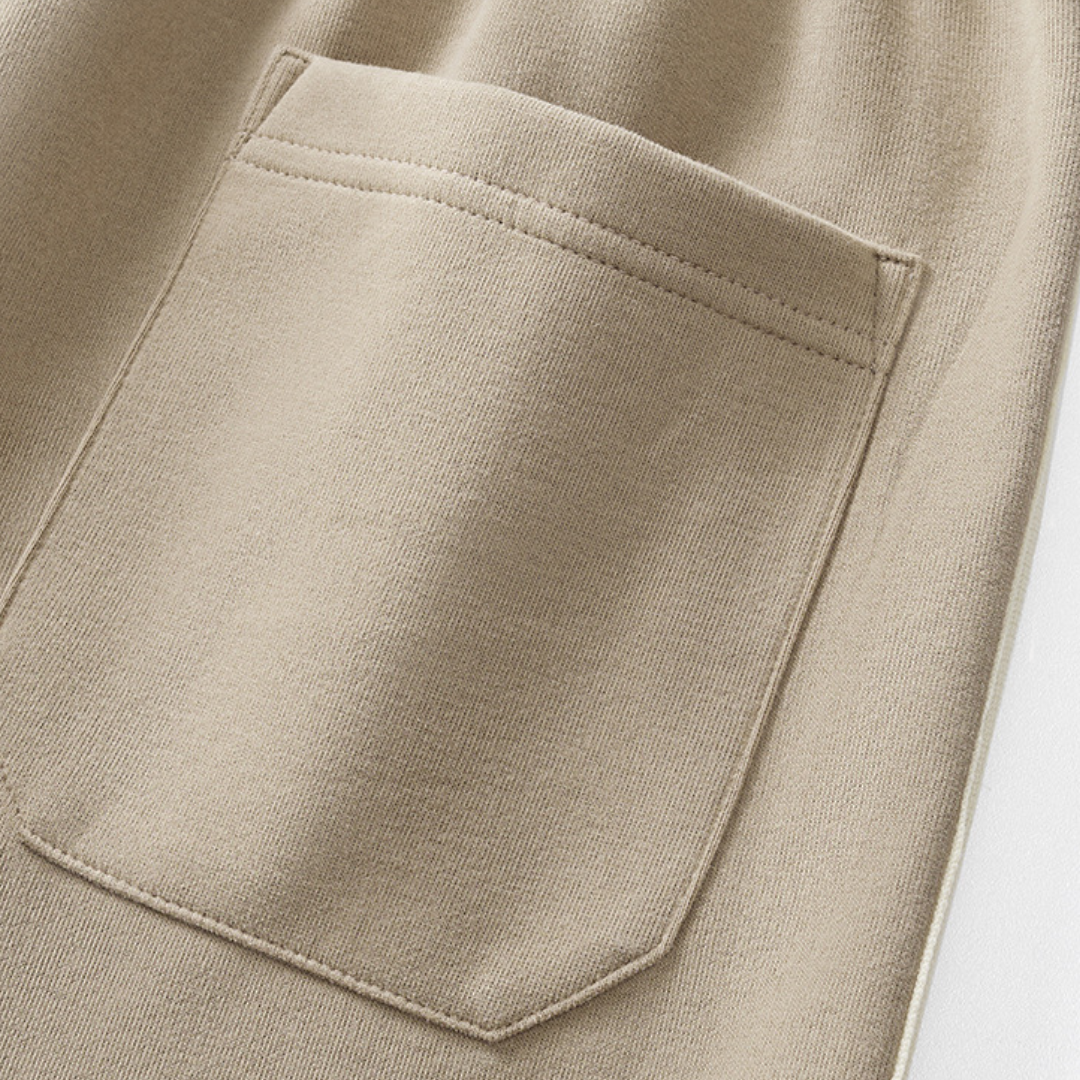 "Men's cotton tracksuit with zip-up jacket, drawstring pants; features sporty stripes, ideal for workouts or casual wear."