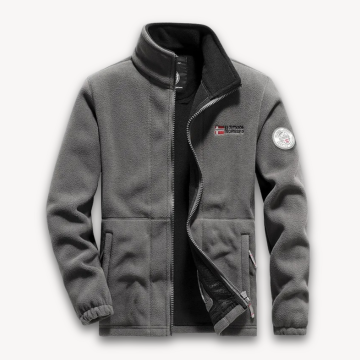 "Men's fleece jacket with full-zip front, thermal lining, in navy, side view against a white background."