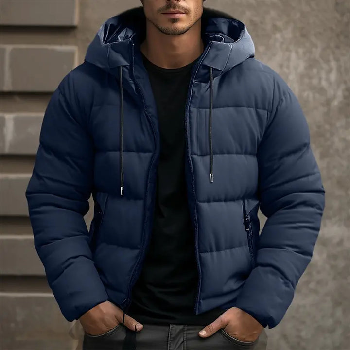 Men's insulated puffer jacket with hood, sleek black quilted design, ideal for winter warmth and style.