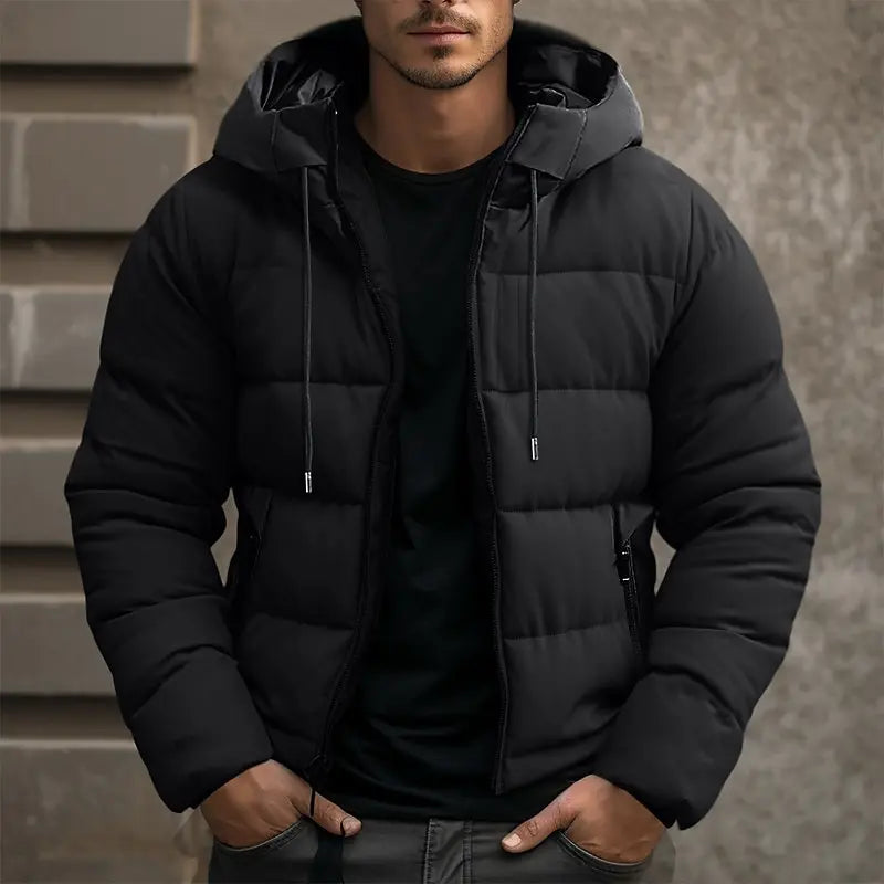 Men's insulated puffer jacket with hood, sleek black quilted design, ideal for winter warmth and style.
