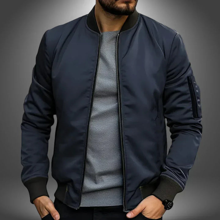 "Men's lightweight bomber jacket, casual windbreaker style with slim fit, features ribbed cuffs and arm zip pocket."