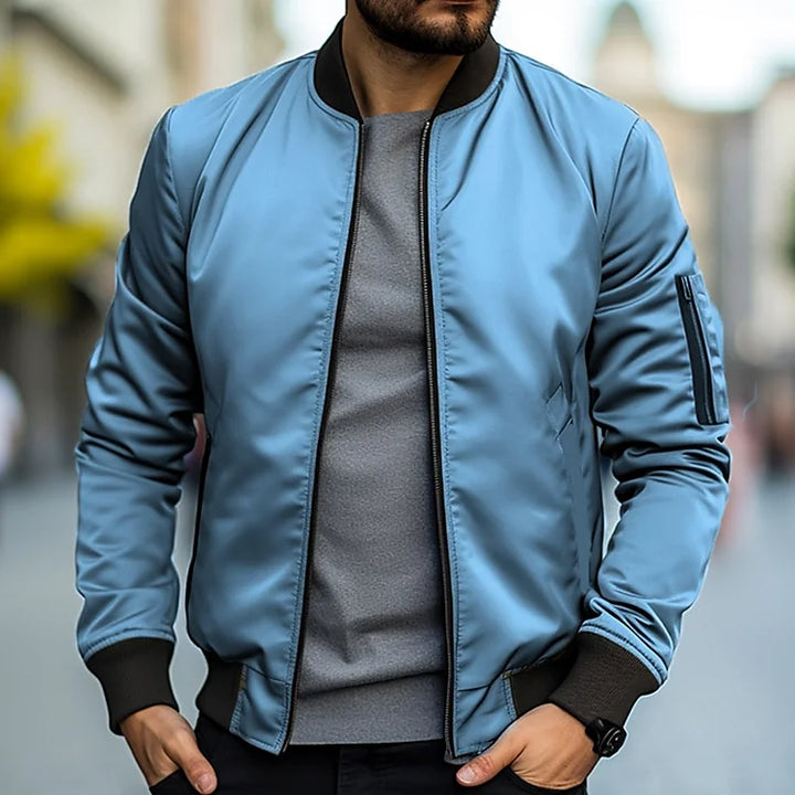 Men's lightweight bomber jacket with ribbed trim, regular fit, sleek design, versatile casual style, and breathable fabric.