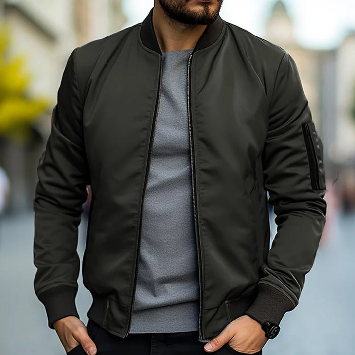 Men's lightweight bomber jacket with ribbed trim, regular fit, sleek design, versatile casual style, and breathable fabric.