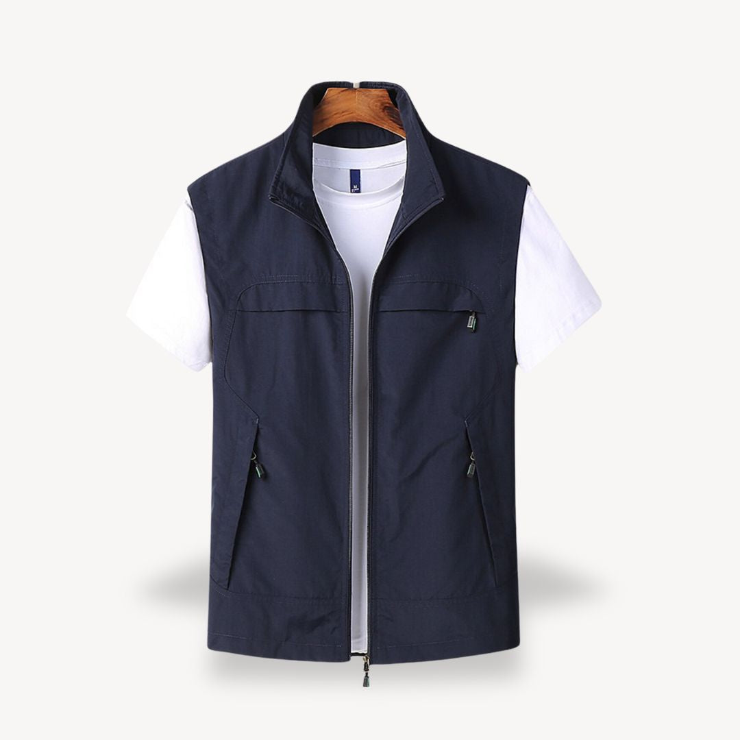 Men's lightweight quilted vest, stylish layering in navy blue, full zip, insulated yet non-bulky, perfect for cooler seasons.