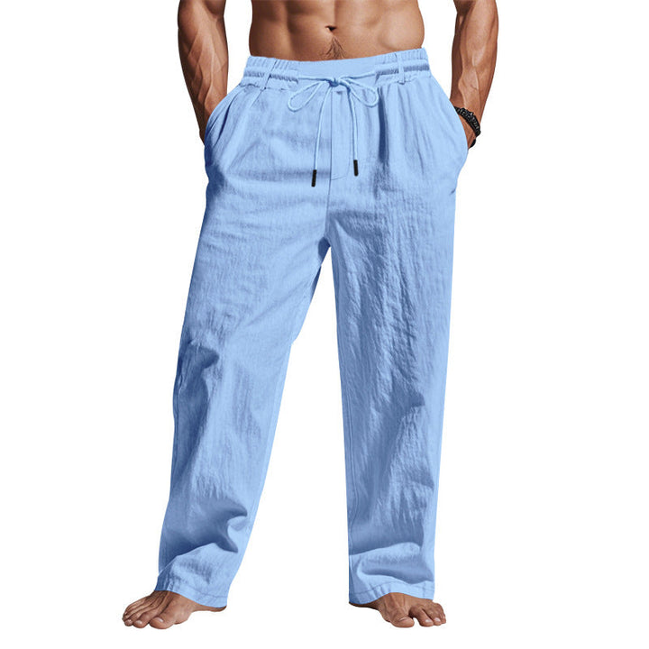 "Men's linen trousers with drawstring waist, relaxed fit, lightweight breathable fabric, ideal for casual and sunny days."
