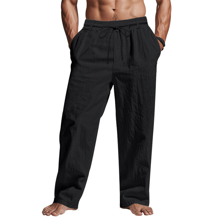 "Men's linen trousers with drawstring waist, relaxed fit, lightweight breathable fabric, ideal for casual and sunny days."