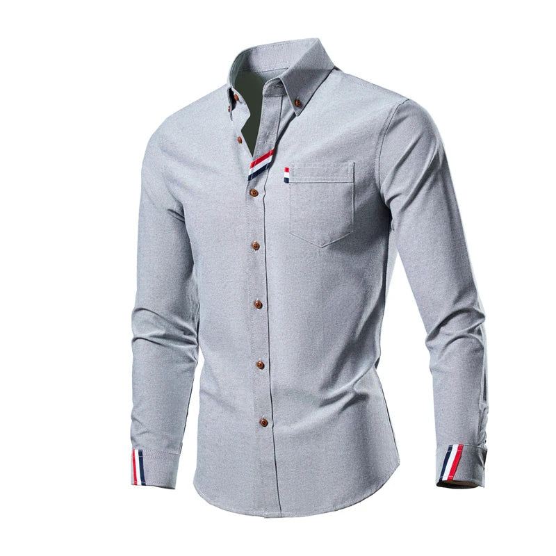 Men's long-sleeve cotton shirt with button-down front, structured collar, and classic style for sophisticated daily wear.