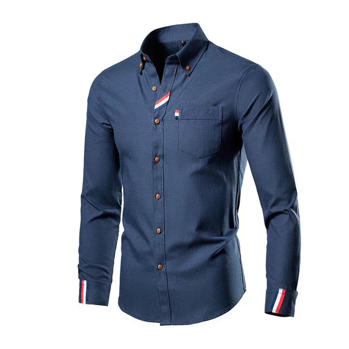 Men's long-sleeve cotton shirt with button-down front, structured collar, and classic style for sophisticated daily wear.