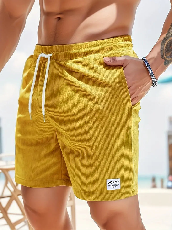 "Men's loose-fit corduroy shorts with drawstring waist in various colors, soft texture, relaxed fit for casual wear."