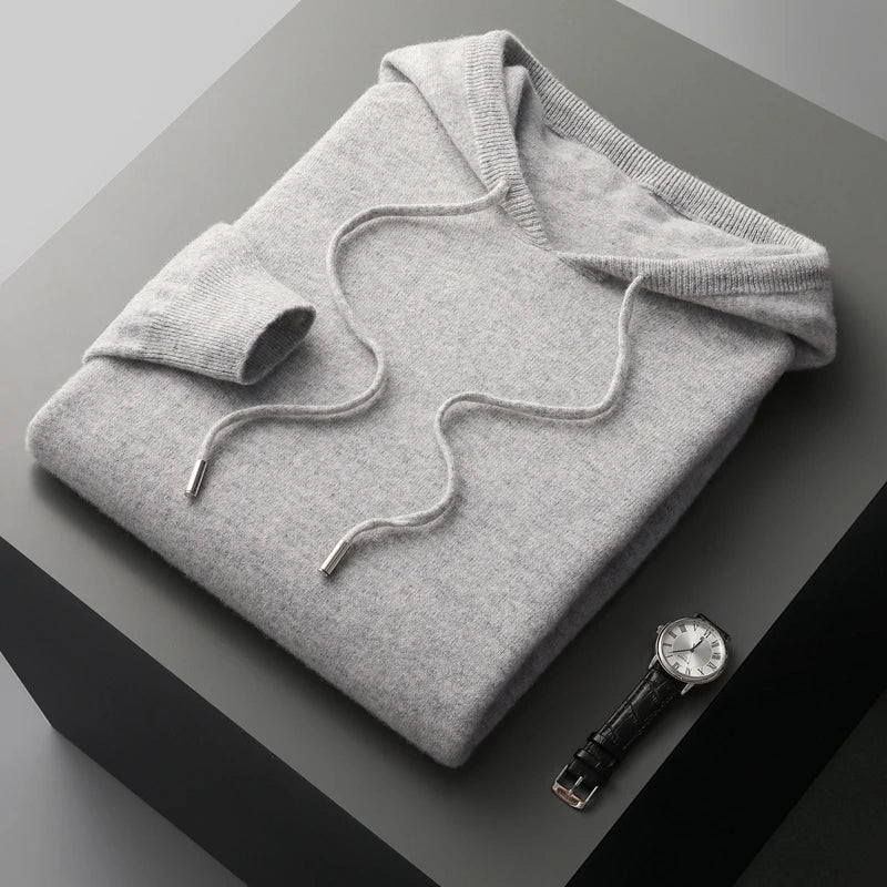 "Men's luxury cashmere hoodie with adjustable hood, slim fit, ribbed cuffs, in versatile colors, soft and breathable."